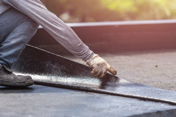 Professional Basement Waterproofing technician working in Harrisburg, OH
